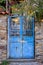 Old blue metallic gate in Parthenonas village, Chalkidiki, Greece