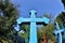 Old blue orthodox Christian crosses in abandoned ukrainian village
