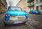 Old blue plastic cheap car Trabant 601 parked