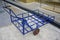 Old blue pull along wagon cart with 3 wheels for heavy duty park