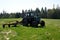 Old blue russian agricultural tractors in the field