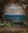 Old blue wooden bench on concrete wall framed with trees