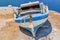 Old blue wooden shabby fishing boat