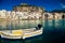 Old boat drifting in a Cefalu harbor