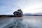 Old boat stuck in ice