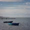 Old boats in choppy waters