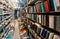 Old books on shelves of a retro bookstore, with vintage novels, poems, science volumes for readers