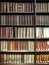 old books stacked on wooden shelves