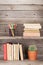 Old books on a wooden shelf