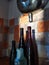 Old bottles in sunlit kitchen