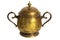 An old brass or bronze metal sugar bowl with a lid and ornament. Metal punctles with scratches and patina.
