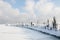 Old breakwater covered in snow