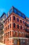 Old Brick Apartment in Blue Windows