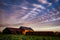 Old brick barn at sunrise