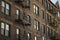 Old brick building with an exterior stair fire escape, New York, USA