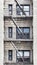 Old brick building with iron fire escape, New York City, USA