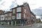 Old brick buildings at street corner on Monkgate and St Maurice Road in historic district of City of York, England, UK