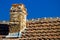 Old brick chimney and roof