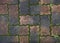 Old brick and green moss floor pavement