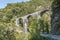 Old brick railway bridge in the Centovalli in Switzerland