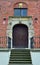 Old brick stone facade, portal and windows in Dutch style