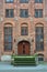 Old brick stone facade and windows in Dutch style