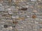 Old brick stone wall background, rural mediterranean stonewall