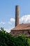 Old brick tall chimney of a former sugar factory. Old preserved factory in Zidlochovice Czech Republic