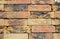 Old brick textured wall. Background of old vintage brick wall. Close up on Vintage brick wall photo.