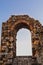 Old brick wall arch in sicily