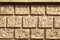 Old brick wall background. wall from squared bricks