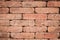 Old brick wall closeup - tiled stone background