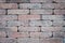 Old brick wall closeup - tiled stone background