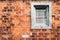 Old Brick Wall with Grey Window