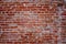 Old brick wall reddish orange.