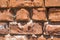 Old brick wall showing weathered texture