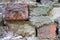 Old brickwork. Brick wall. Red and white silicate brick. Crumbling brick from time to time