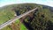 Old bridge constriction over valley river aerial shot Mungstener