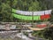 old bridge and flags of a Tibet