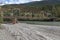 Old bridge over the Dyea river near the Klondike gold rush historical Park near Skagway Alask