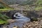 Old bridge over Mill Gill or Old Gang Beck at Old Gang on Reeth High Moor, Yorkshire UK 