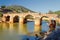 Old bridge in San Rafael on the Odiel river, Spain