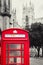 Old british red phone booth with the York Cathedral