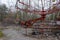 An old broken carousel in the abandoned city of Pripyat. Abandoned amusement park