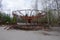 An old broken carousel in the abandoned city of Pripyat. Abandoned amusement park