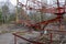 An old broken carousel in the abandoned city of Pripyat. Abandoned amusement park