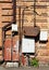 Old broken switchboard in interior of destroyed manufacturing plant. Broken, disassembled, plundered electrical switchboard. Broke