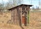 Old broken village toilet.