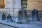 Old bronze bells on the pavement. The Captain Generals Palace