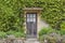 Old brown doors in an english stone house